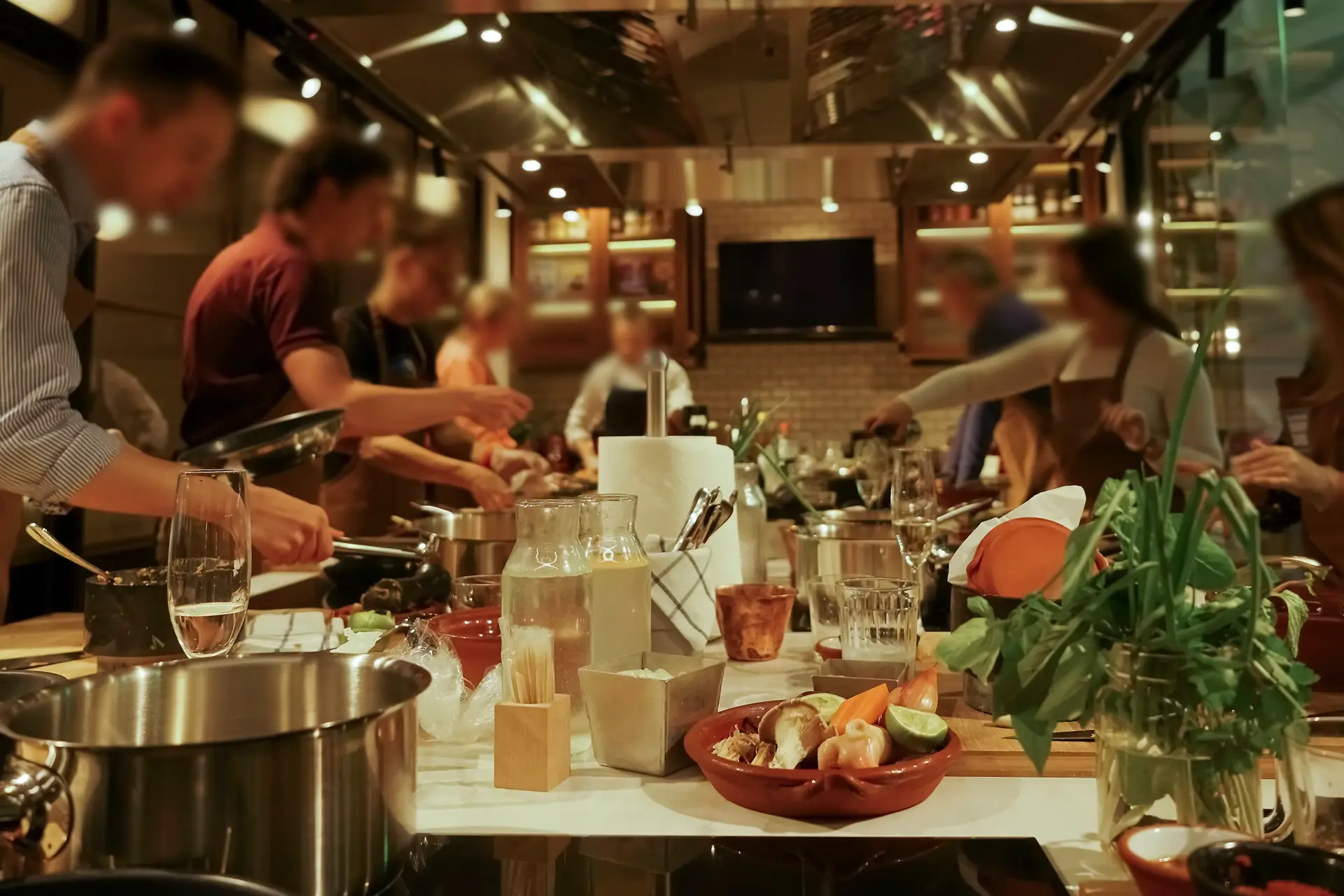 Chefs preparing a dining experience in an open kitchen